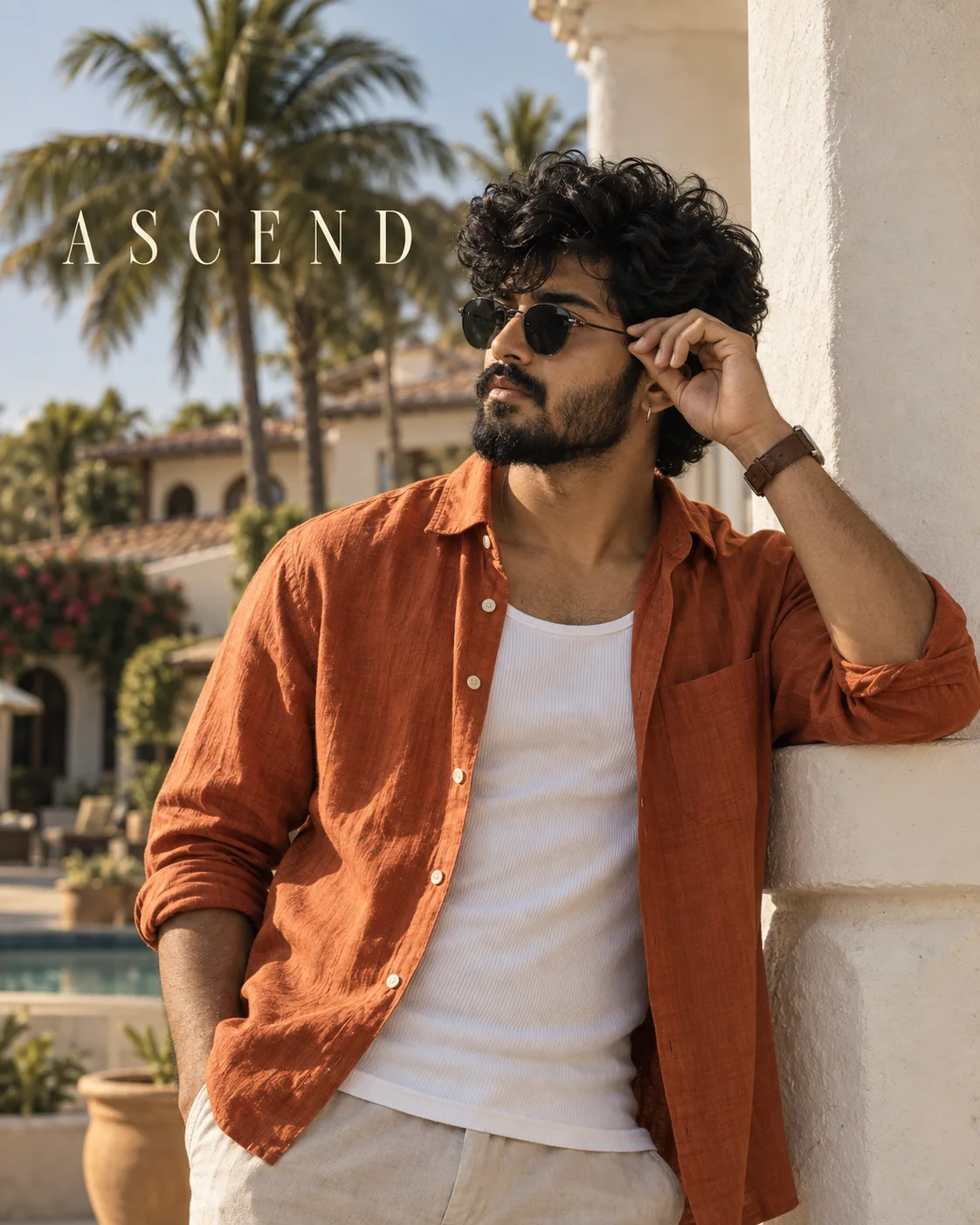 Ultra-realistic cinematic outdoor fashion portrait of a stylish young South Indian man with thick voluminous wavy black hair and a neatly