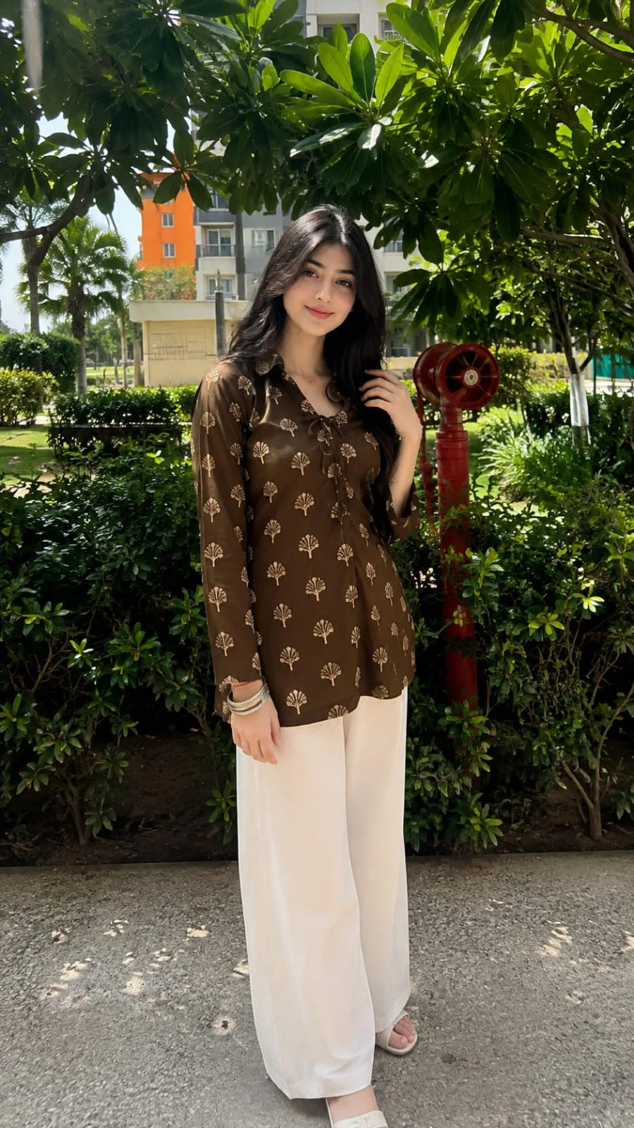 Create an ultra-realistic, high-detail full-body vertical lifestyle portrait photograph (9:16) of the same young adult South Asian woman