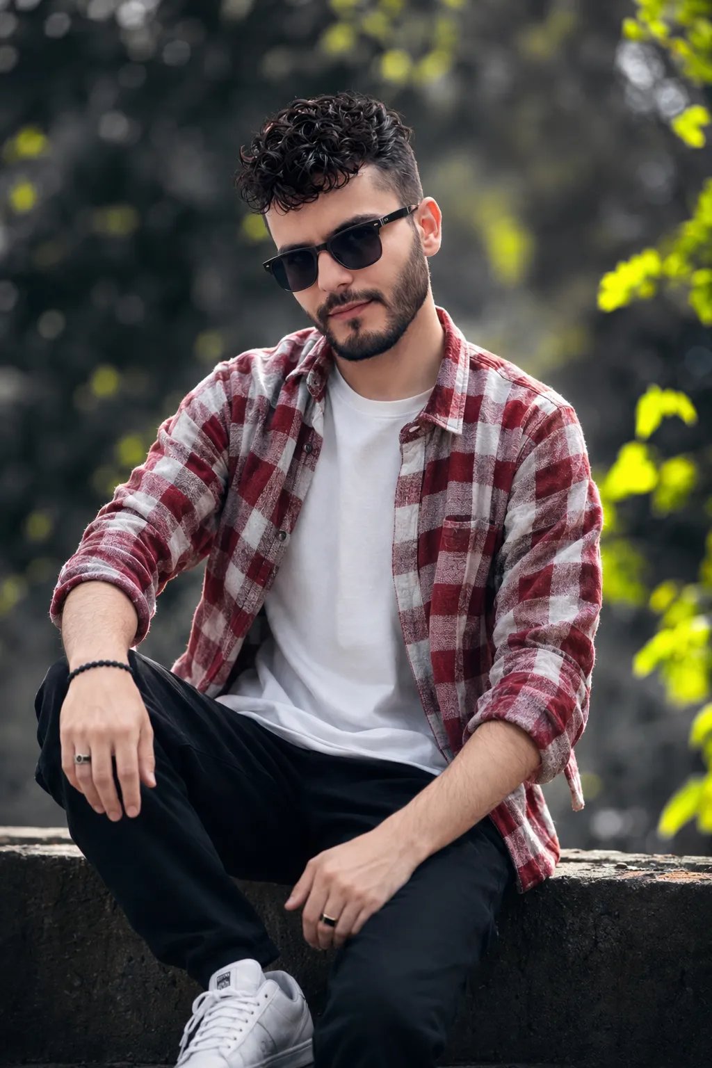 1A hyper-realistic cinematic portrait of a young Indian boy with stylish messy hair, wearing a red and white checkered shirt, black pant