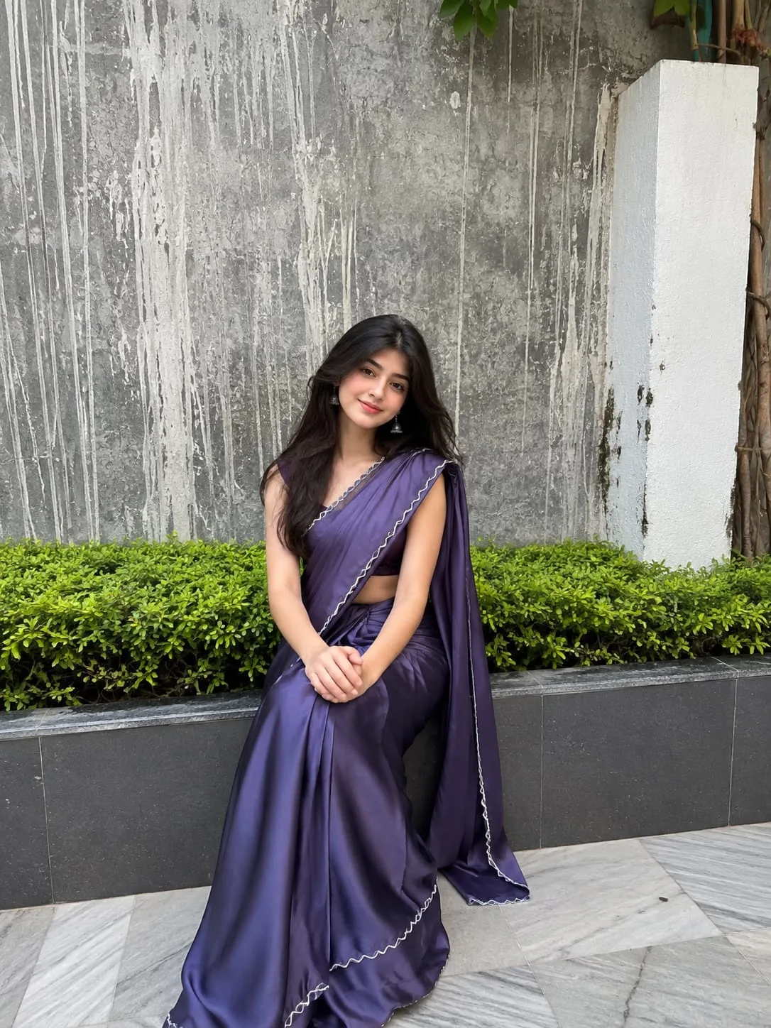 Create an ultra-realistic, high-detail vertical portrait photograph of the same young South Asian woman shown in the uploaded reference
