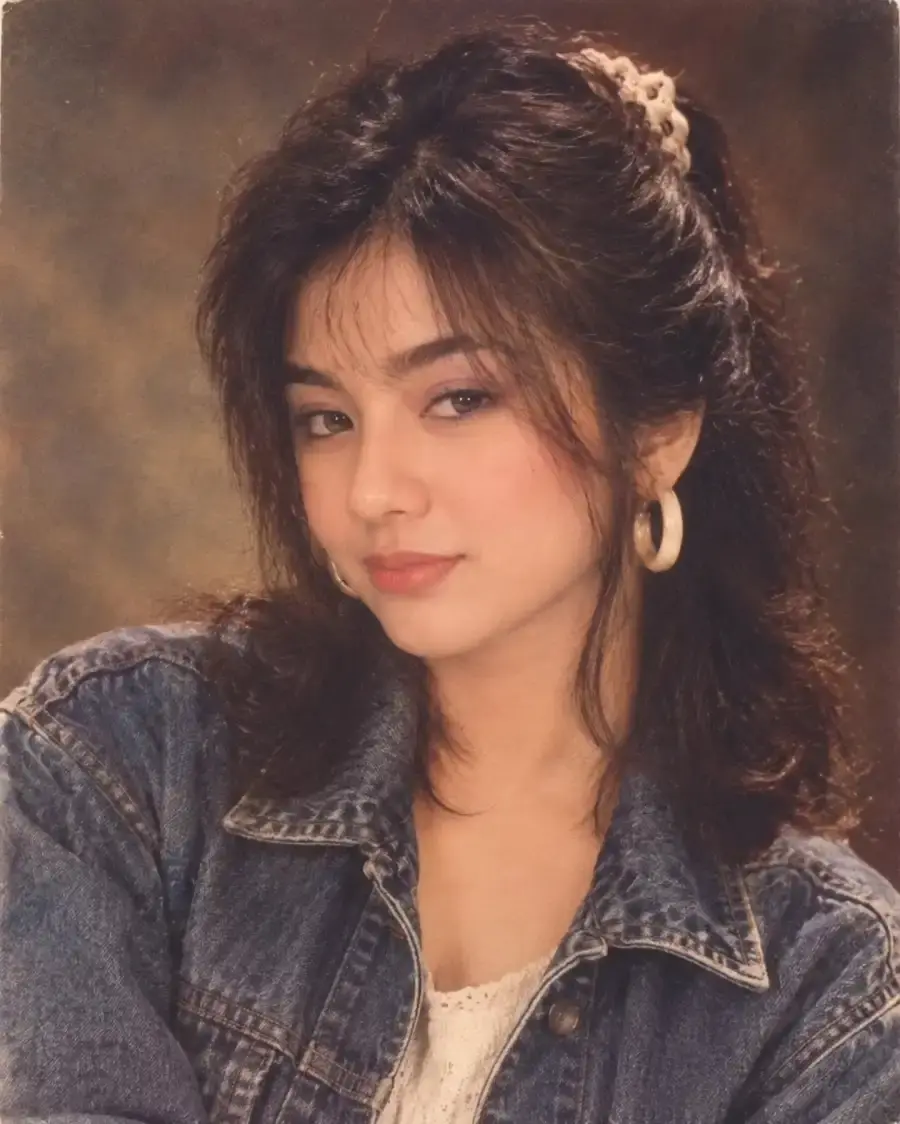Using the uploaded photo as the identity reference, recreate the person as they might have looked in the 1980s.