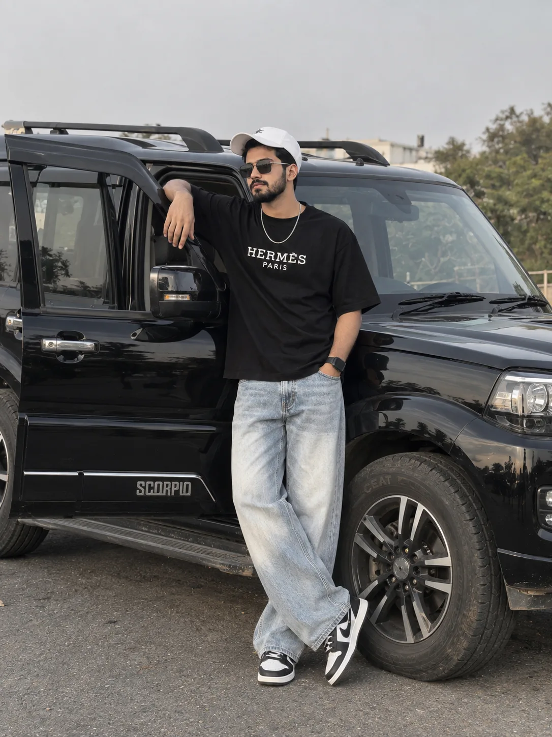 Create image Photorealistic full-body fashion photograph of the same young Indian man from the reference image, preserving his exact facial