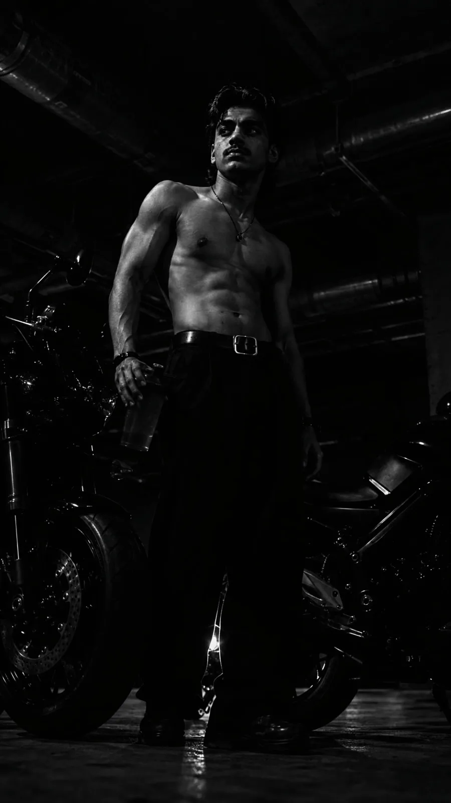 Create an ultra-realistic cinematic black-and-white full-body photograph closely recreating the provided reference image.