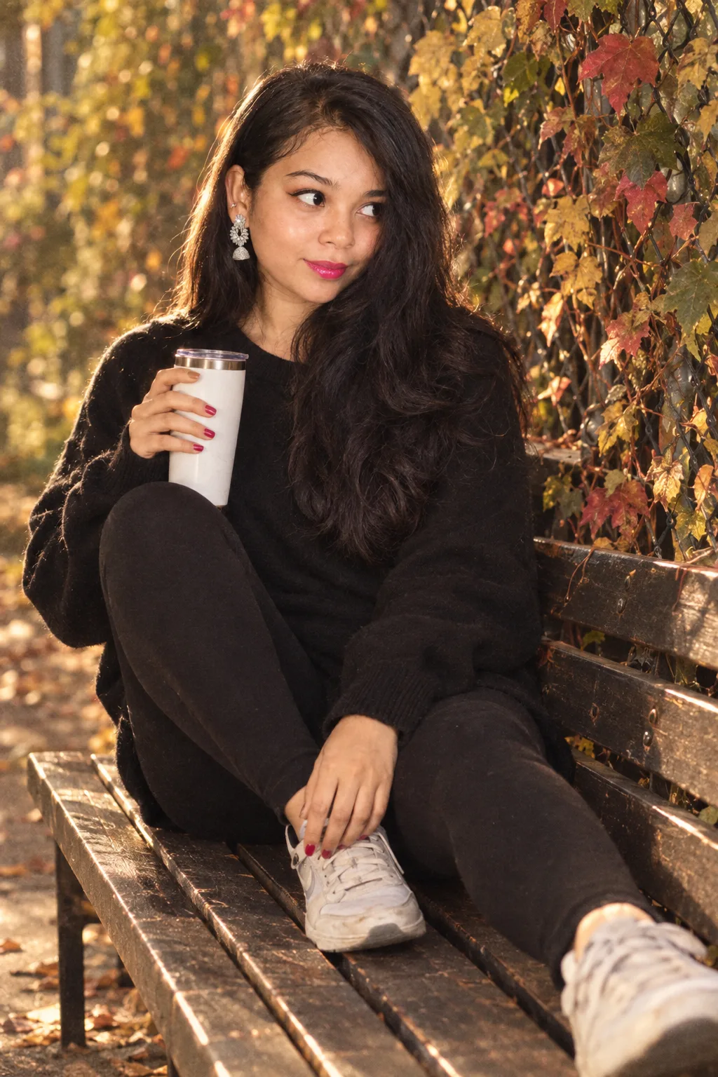 Cinematic portrait of a young woman with fine film grain.
