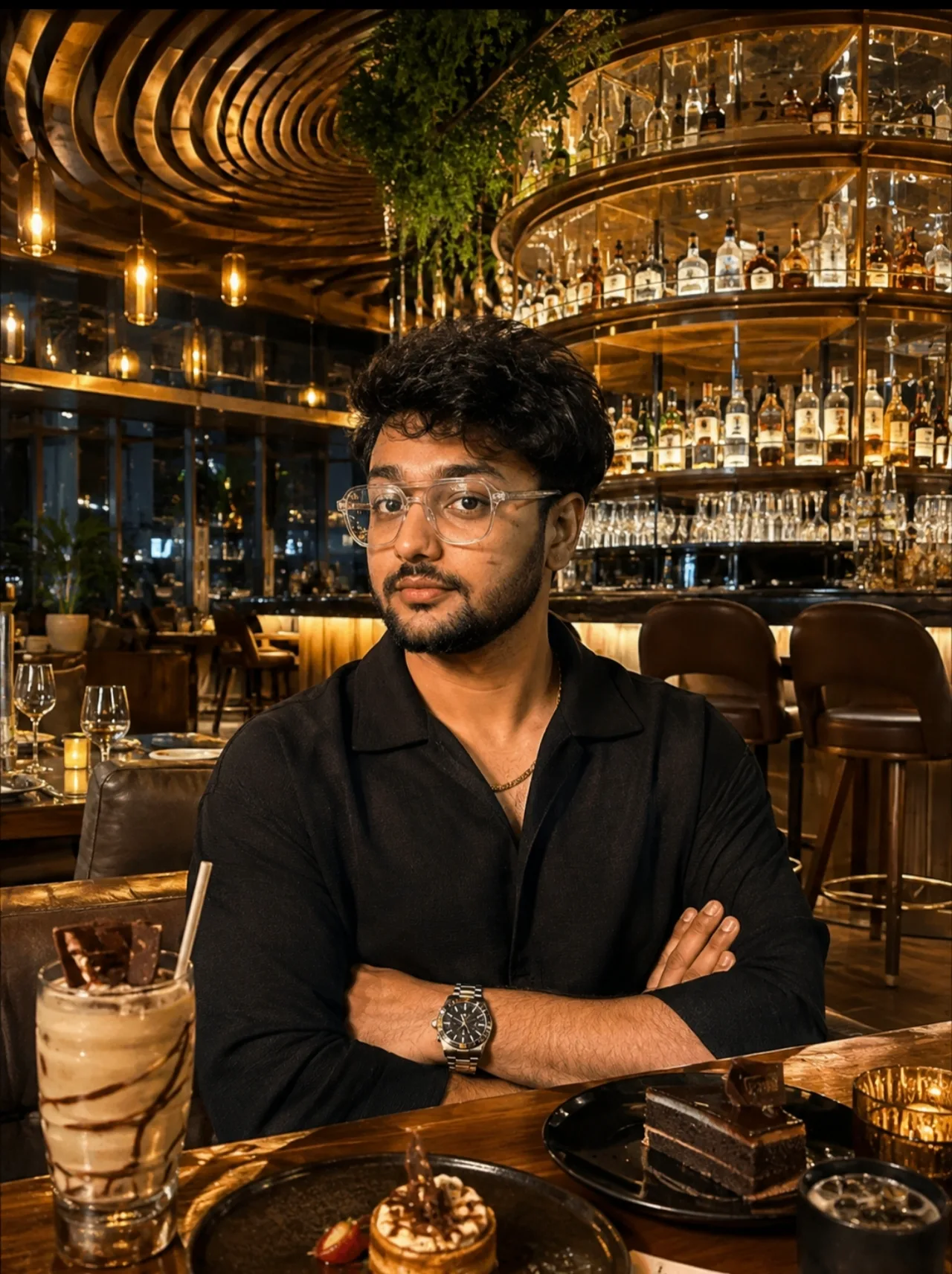 An ultra-realistic luxury lifestyle portrait of a young male fashion model seated confidently inside an upscale designer restaurant with