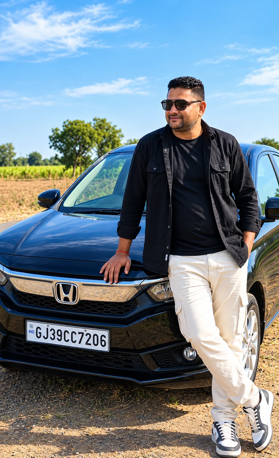 Hyper-realistic 4K Ultra HD cinematic portrait of a stylish South Asian man standing confidently beside a glossy black Honda sedan on a