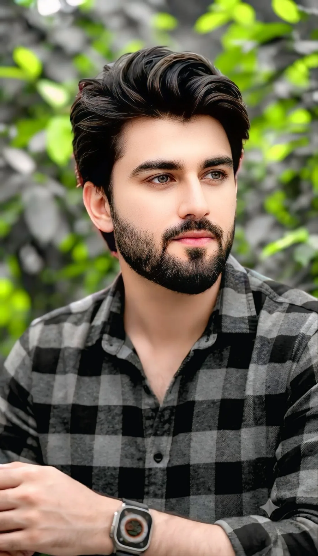 A close-up cinematic casual editorial portrait of an extremely handsome young South Asian man with perfectly styled, voluminous textured