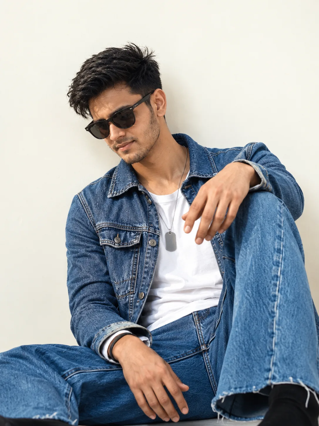 📸 Exact Image Generation Prompt Create an ultra-realistic editorial portrait of a young adult South Asian man, closely inspired by the
