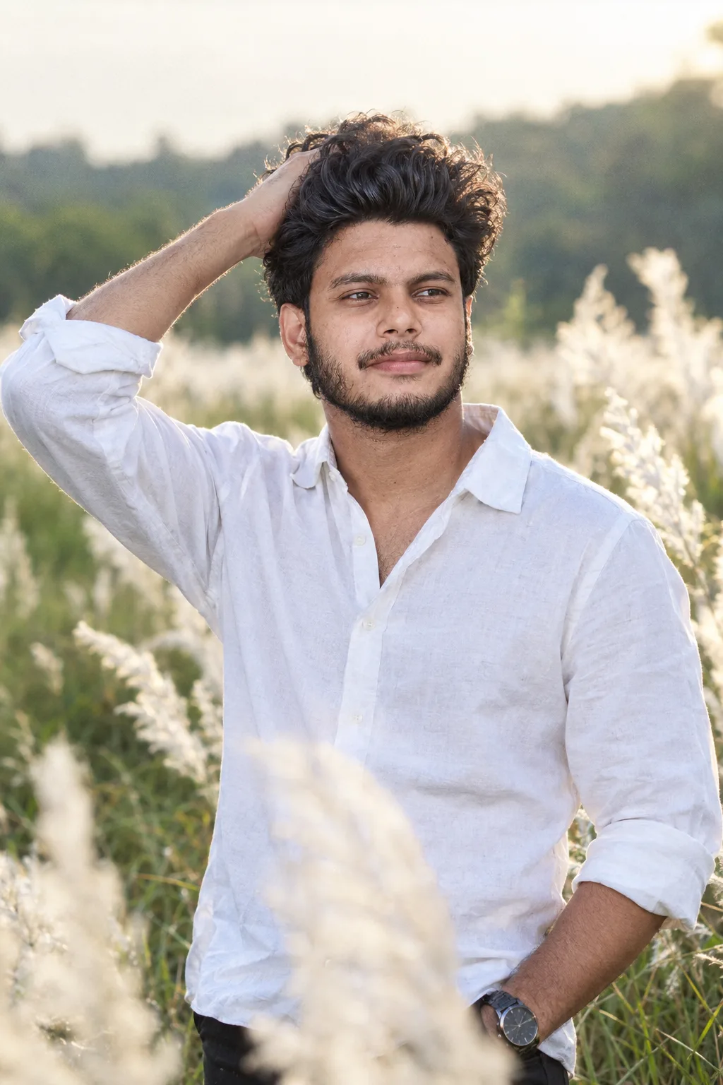 PROFESSIONAL EDITORIAL PORTRAIT PHOTOGRAPH OF A YOUNG INDIAN MAN IN HIS MID-205 SHOT FROM THE WAIST UP, NATURAL EYE-LEVEL CAMERA ANGLE,