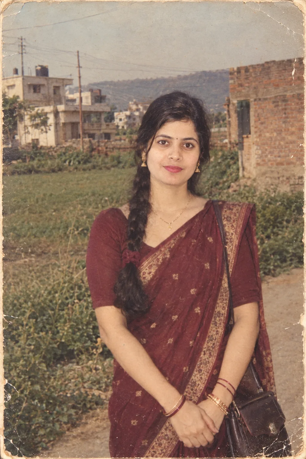 Create a completely authentic 1990s South Asian everyday photograph using the uploaded photo as the EXACT identity reference.
