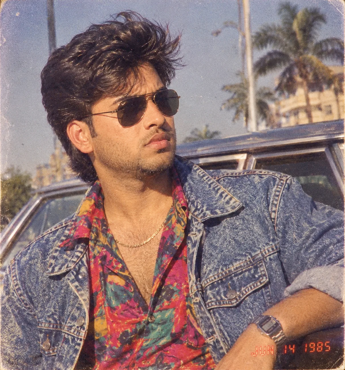 Using my uploaded photo, show me what I would have looked like around 1985.