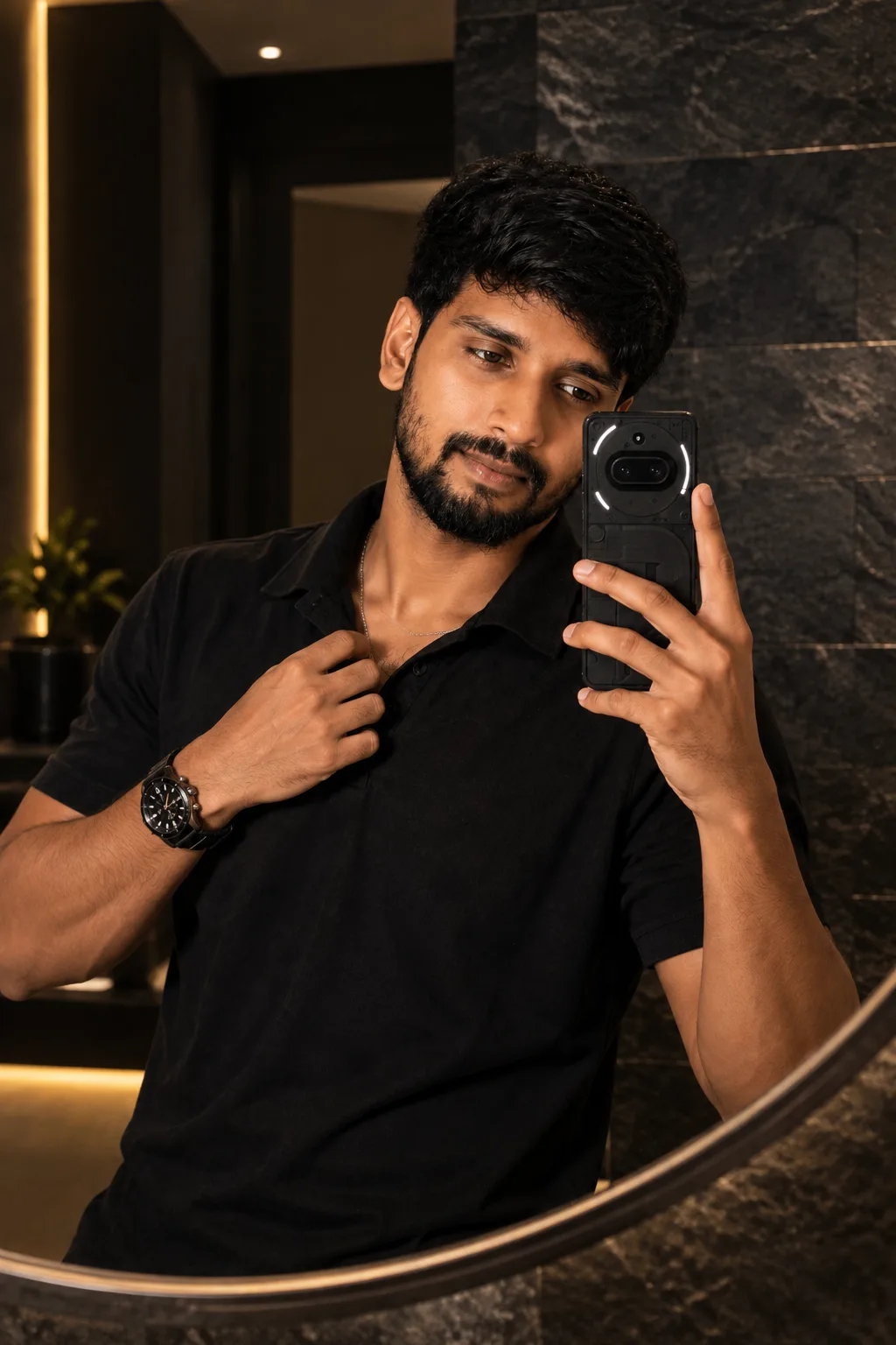 Create a highly realistic professional editorial mirror selfie portrait of a young South Asian man in a premium modern interior.