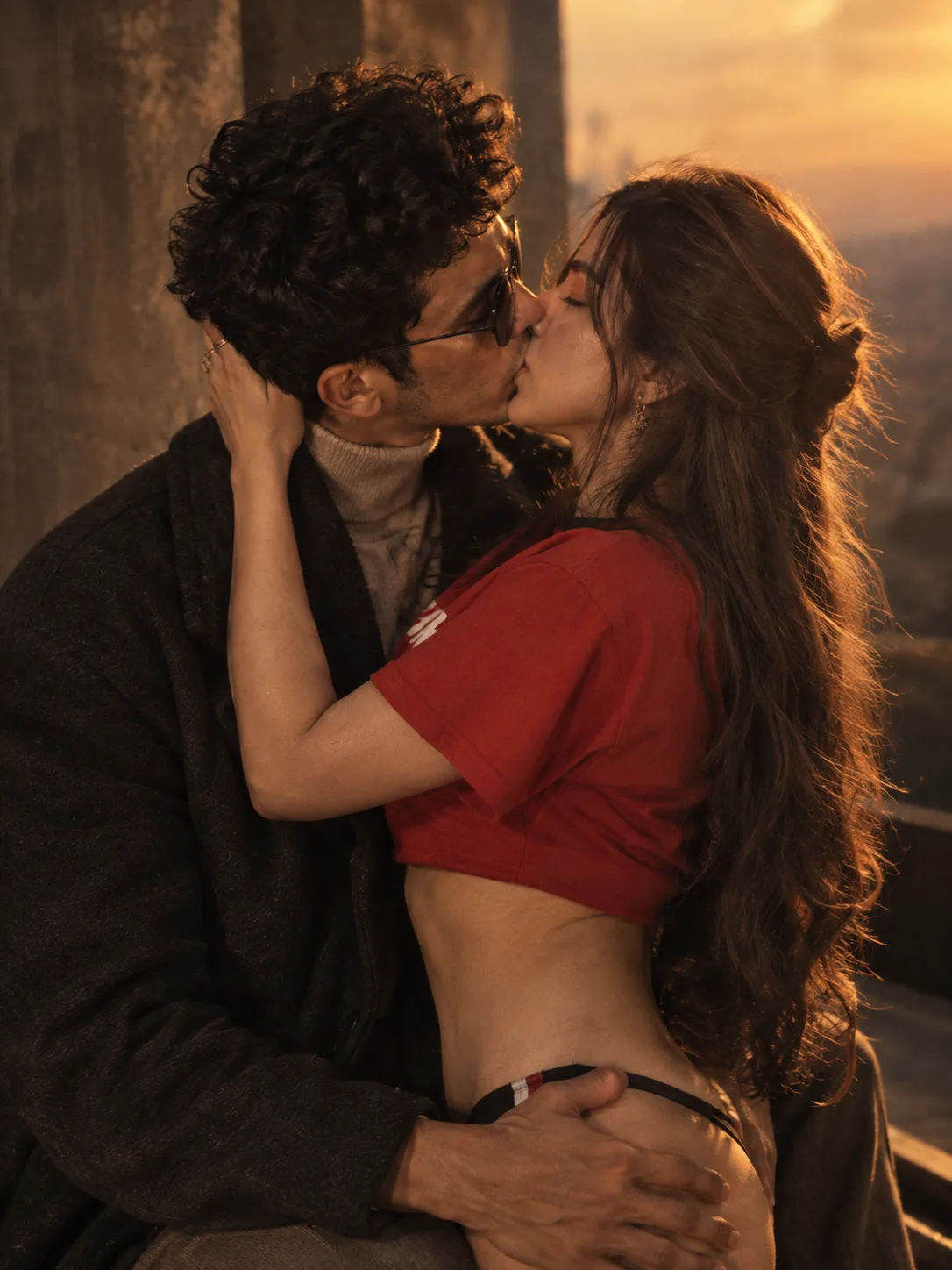Prompt: > Ultra-realistic cinematic romantic couple portrait at golden hour, a young adult man and woman sharing a gentle intimate kiss,