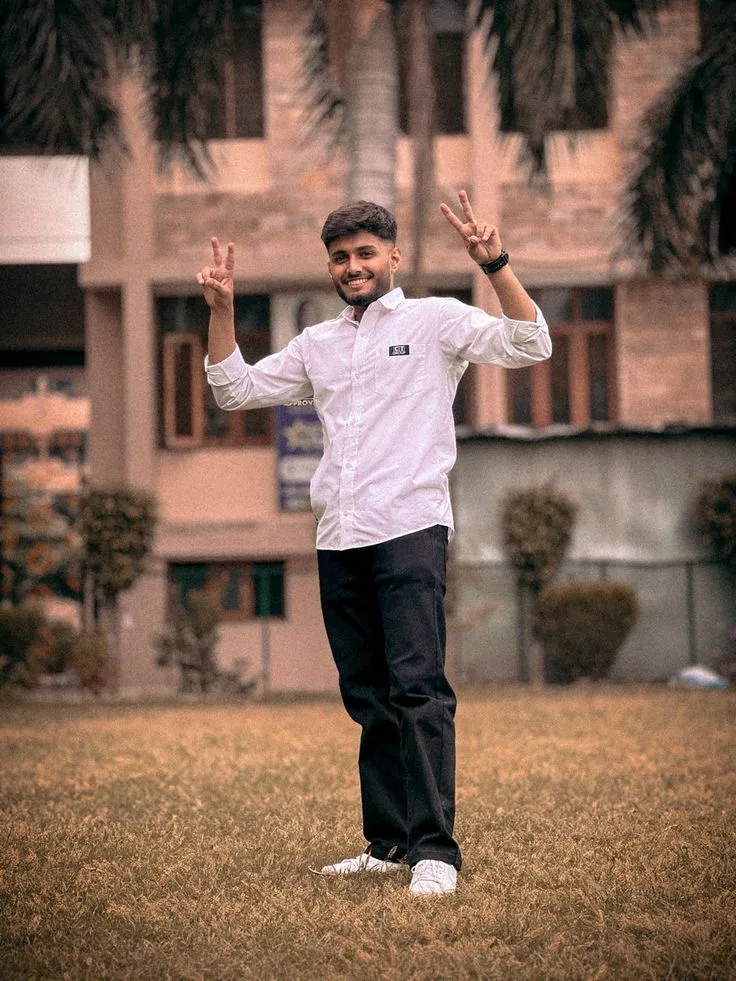A photorealistic vertical full-length portrait in exact 3:4 aspect ratio capturing the young South Asian man from the reference image