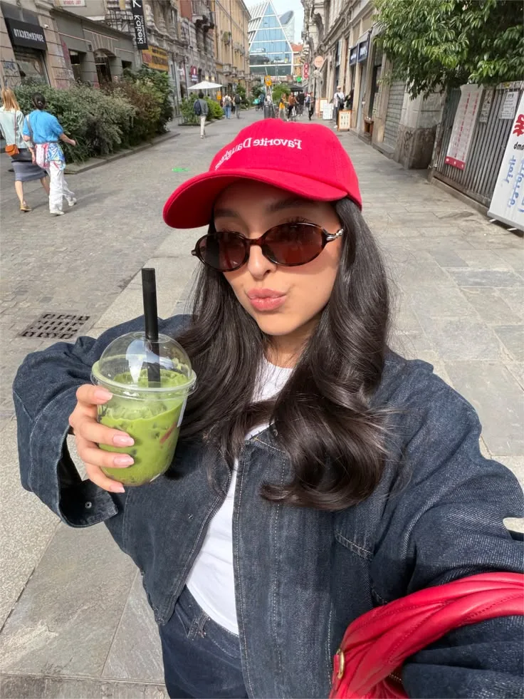 { "photo_design": { "style": "realistic trendy street-style travel selfie", "format": "vertical lifestyle portrait", "aspect_ratio": "4:5",