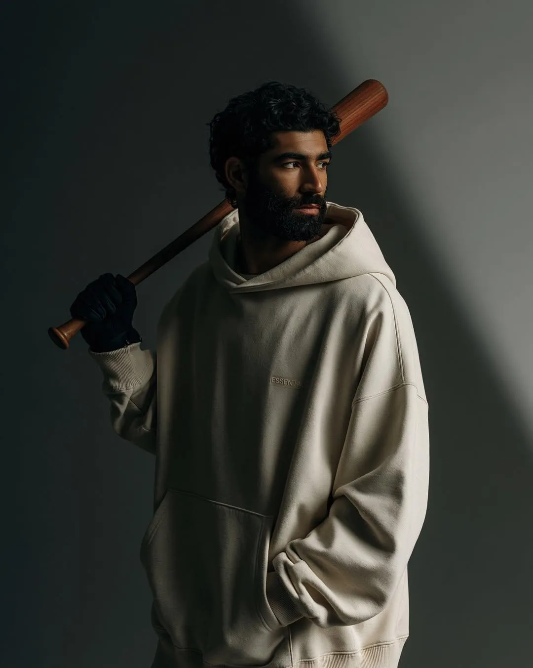 Create an ultra-realistic cinematic masculine fashion portrait based specifically on the uploaded reference image.