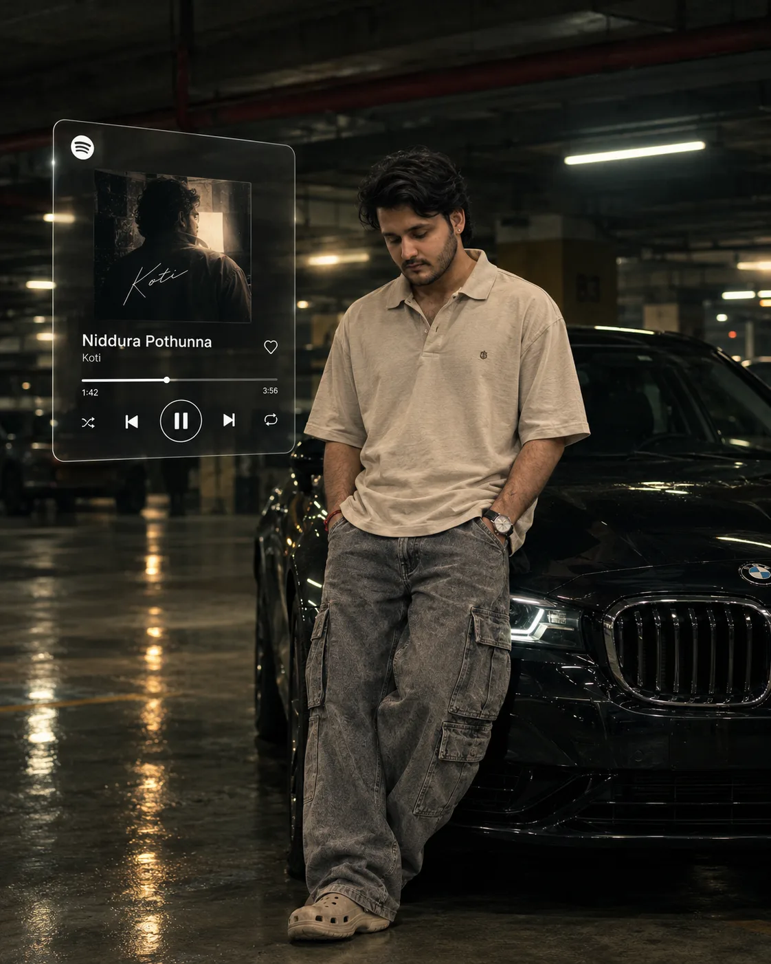 Ultra-realistic cinematic streetwear portrait of a young Indian man standing alone in a dark underground parking garage beside the front of