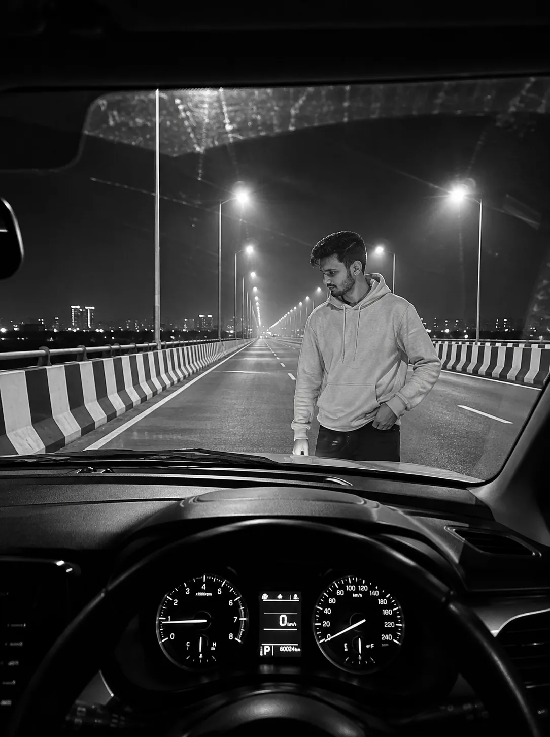 Create an ultra-realistic, high-resolution cinematic black-and-white photograph based specifically on the uploaded reference image.
