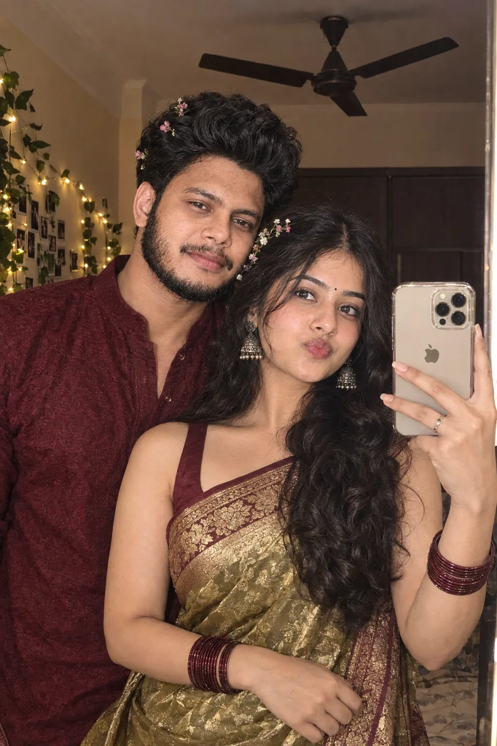 A cinematic smartphone mirror selfie of a young South Asian couple.