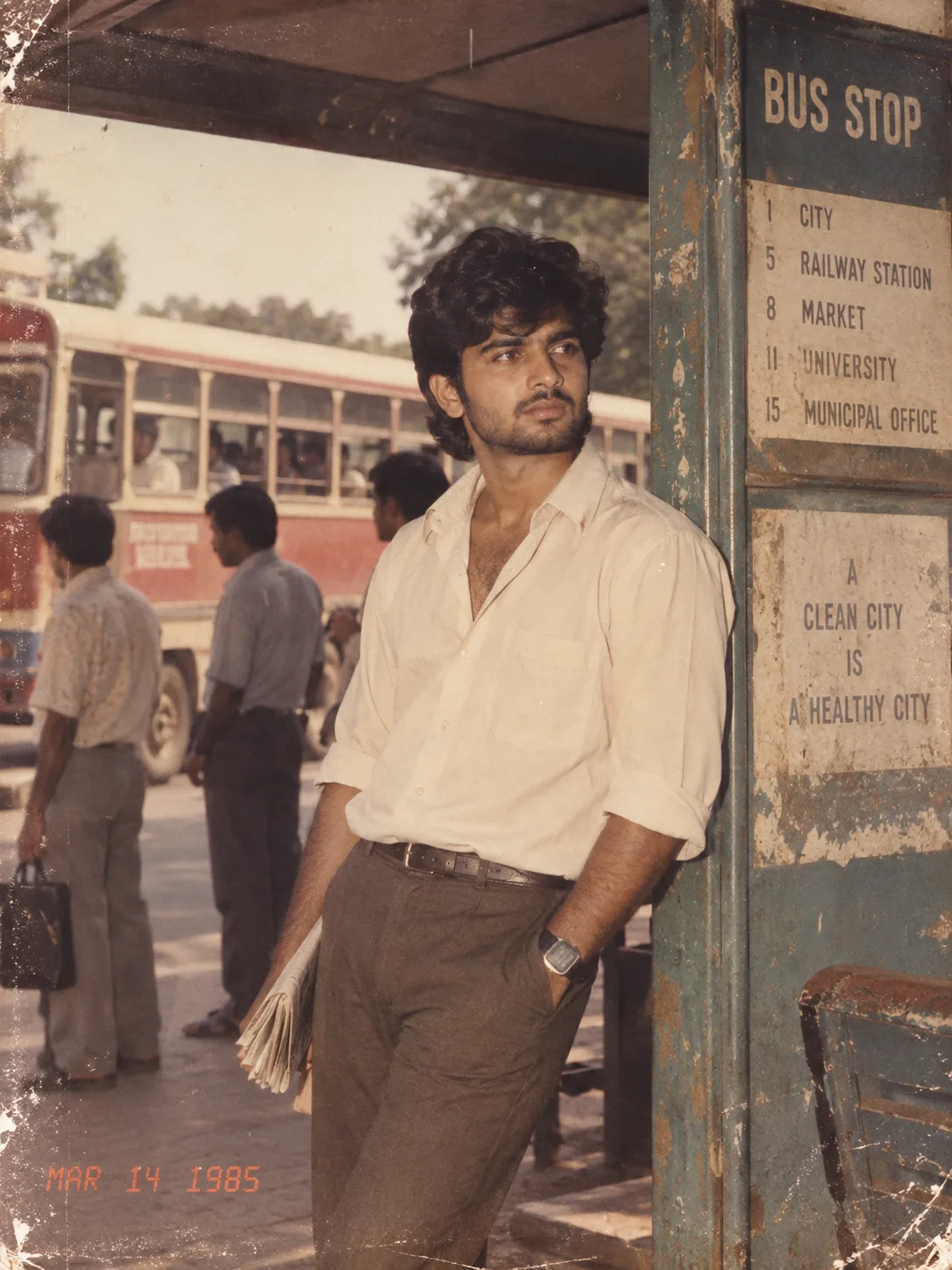 Create an authentic 1985 vintage bus-stop photograph using the uploaded image as the exact facial identity reference.