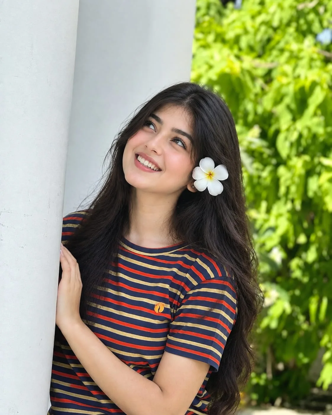 Using my uploaded photo as the ONLY identity reference, create an ultra-realistic outdoor portrait while keeping my face and body identity