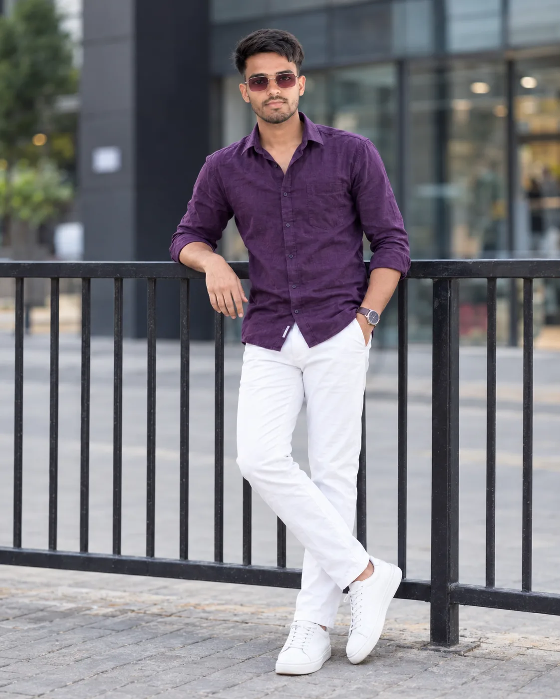 Create a highly realistic full-body fashion portrait of a stylish young South Asian/Indian man standing casually and confidently outdoors