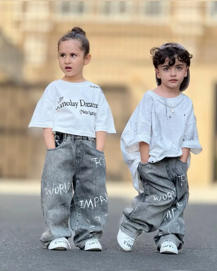 Streetwear Fashion Full-Body Portrait of Two Young Kids in Baggy Denim