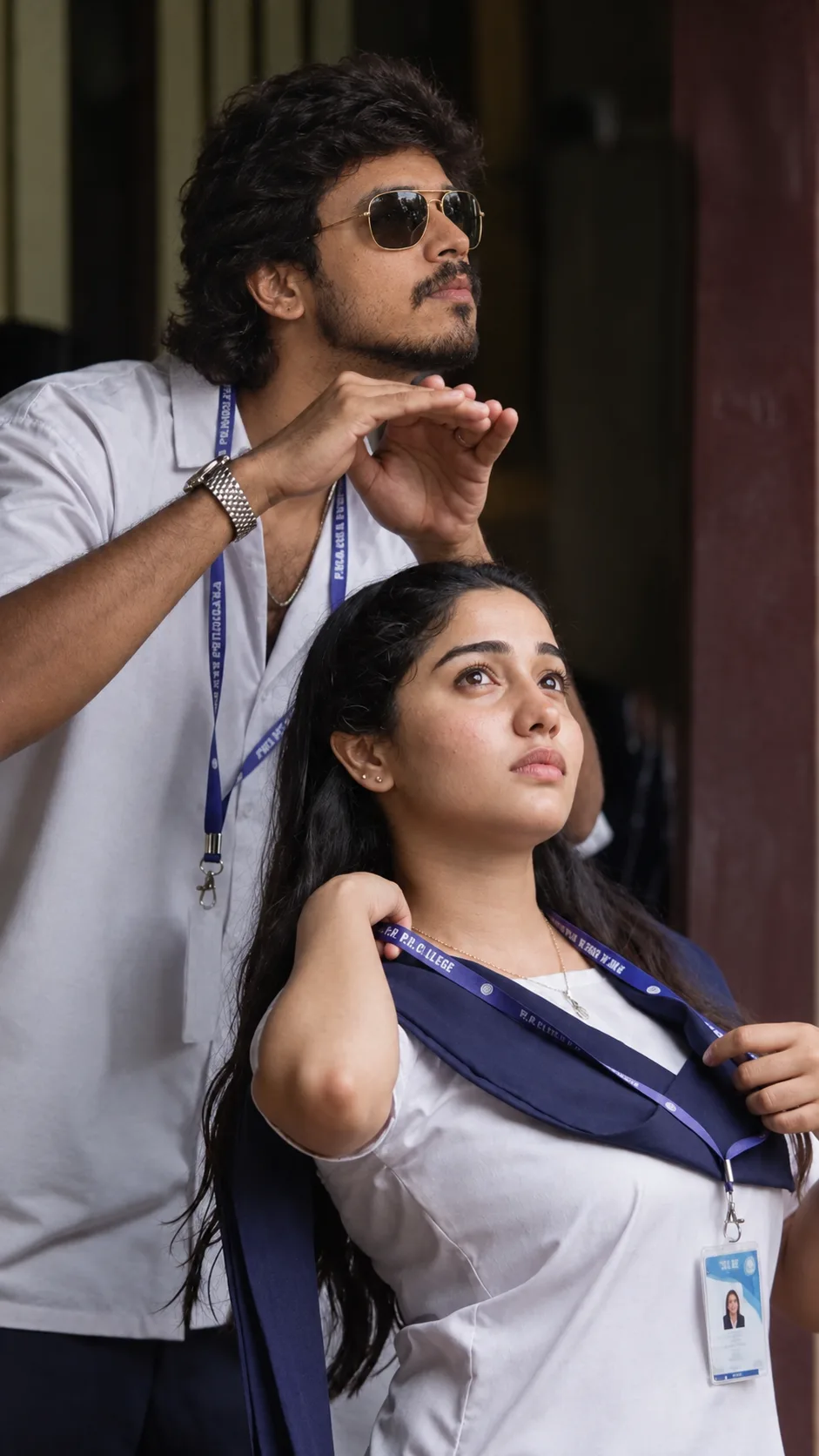 Create a photorealistic vertical 9:16 cinematic portrait of a young Indian college couple standing together in a college corridor.