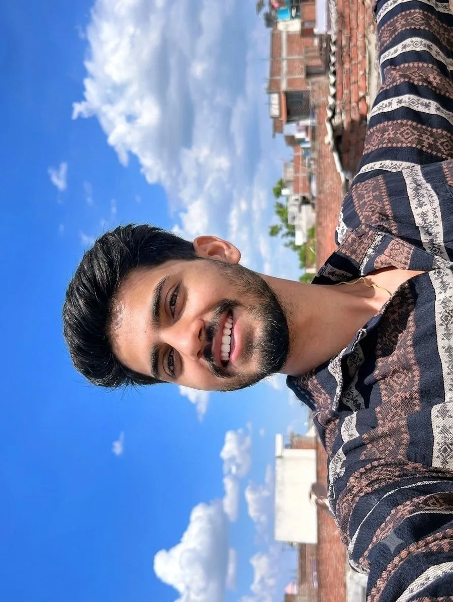 Create an ultra-realistic outdoor rooftop selfie using my uploaded face as the identity reference.