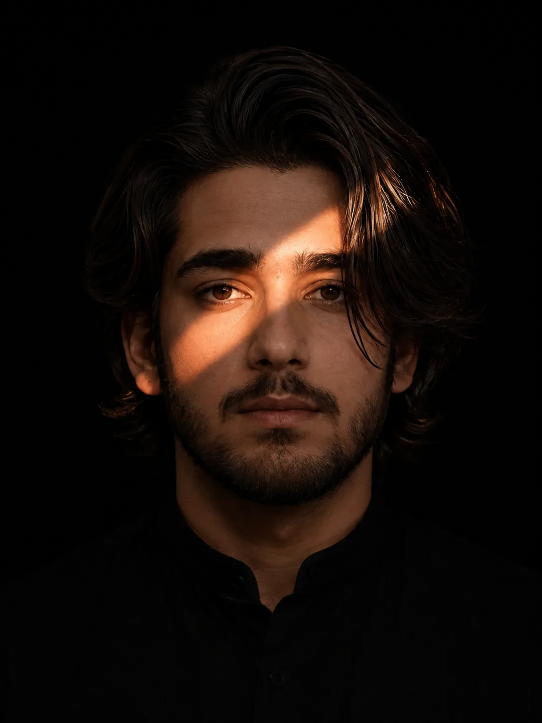 A highly realistic cinematic studio portrait of an Middle Eastern man shown from the shoulders up, facing directly toward the camera with a