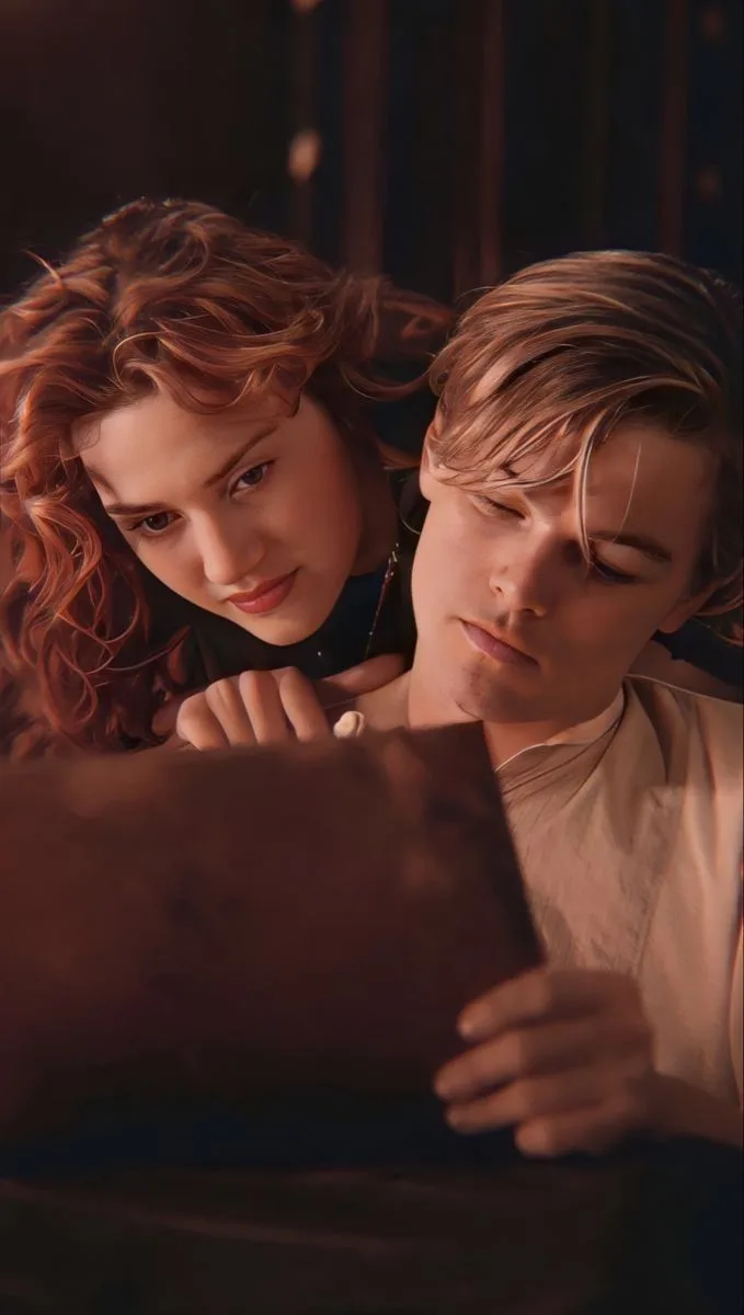CONCEPT: An intimate period-drama close-up portrait featuring a young woman leaning affectionately over a young artist's shoulder as he