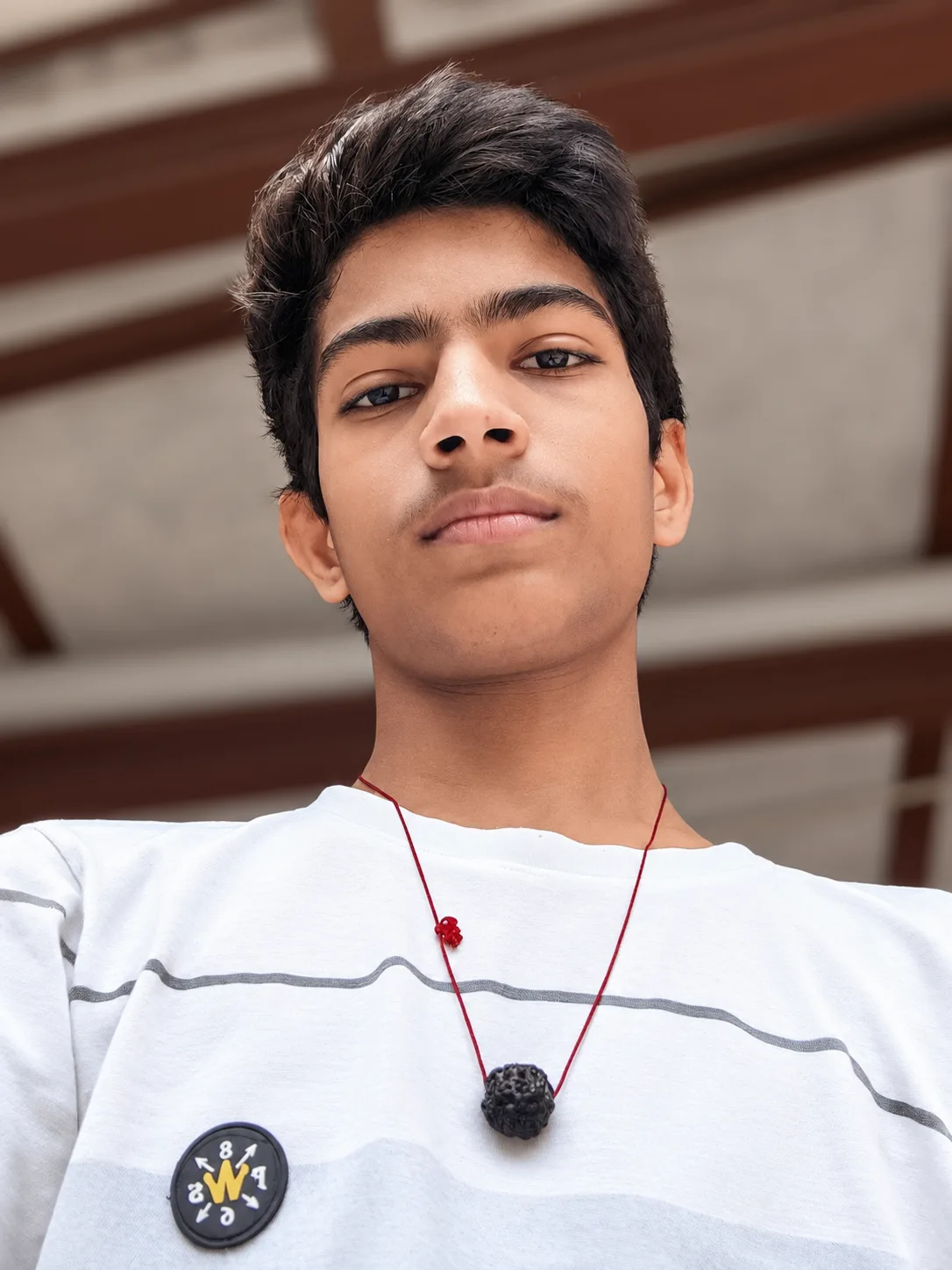 Transform this uploaded smartphone photo into an ultra-high-resolution, professional DSLR portrait.