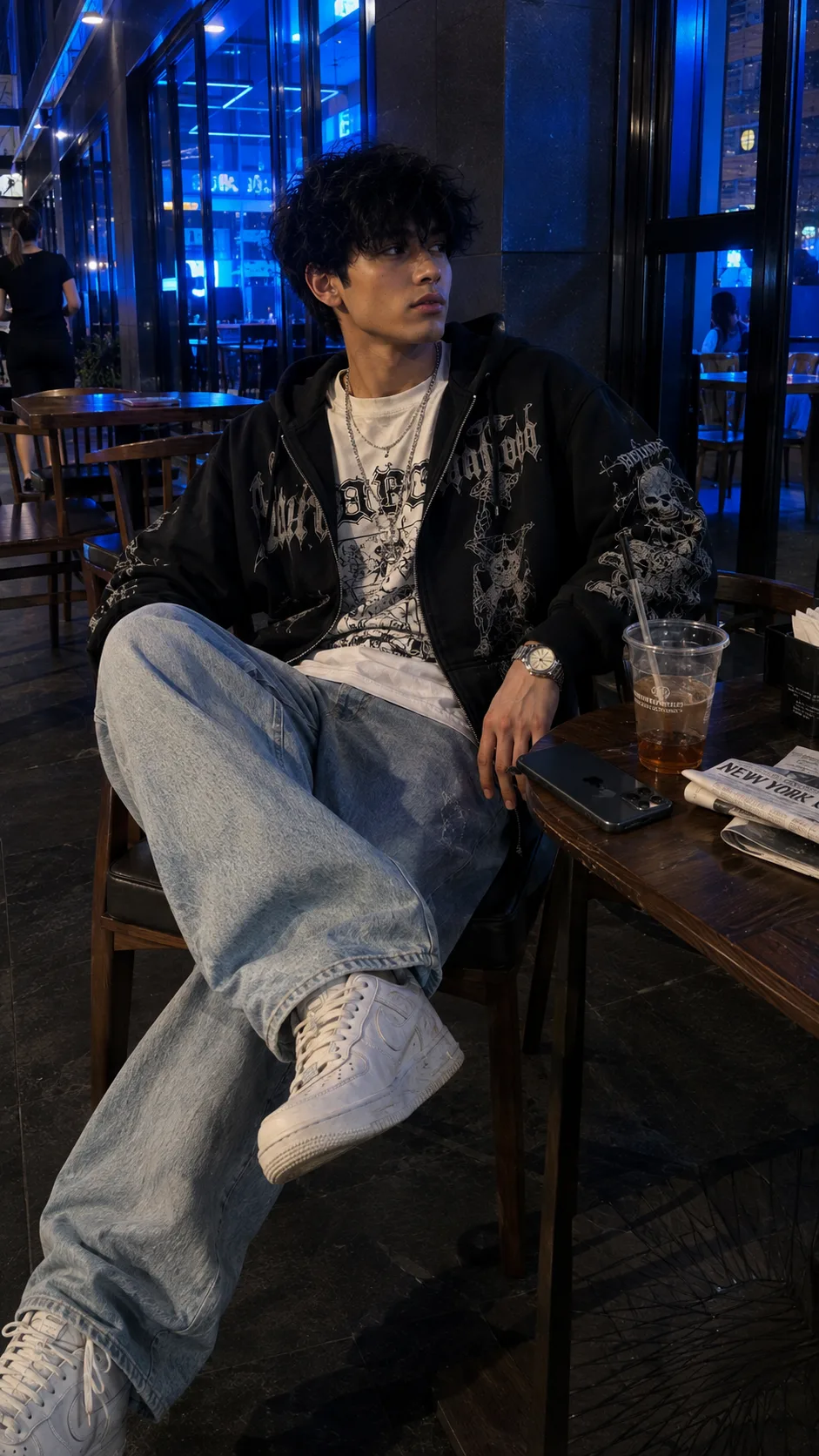 Visual Style: Ultra-realistic lifestyle photography × contemporary streetwear editorial × nighttime café aesthetic × urban youth culture ×