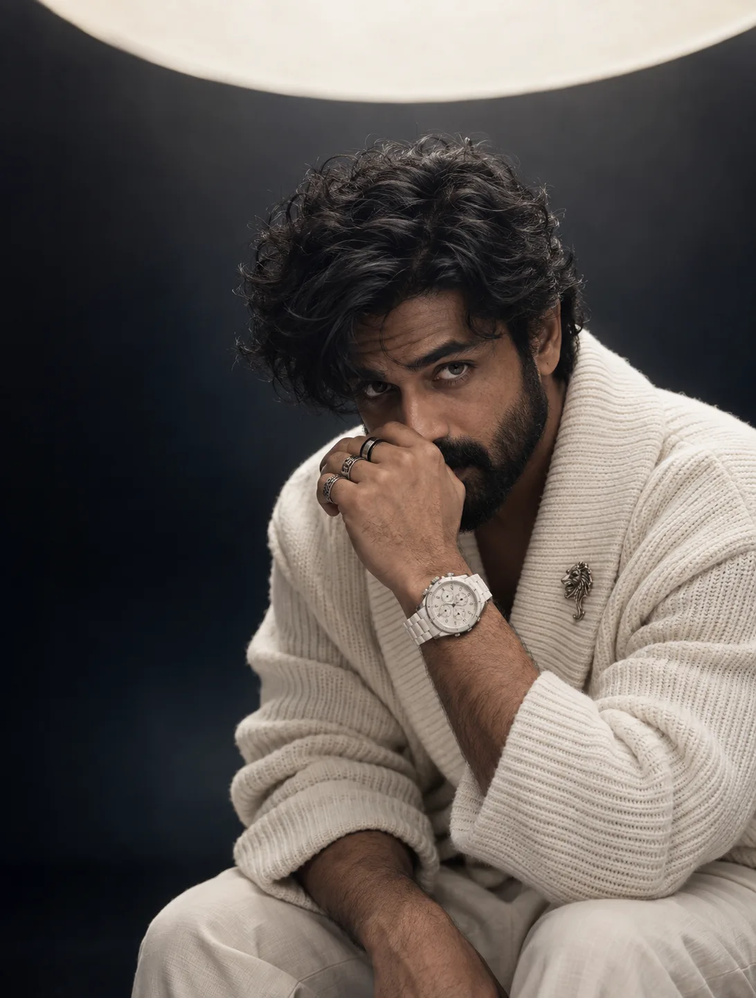 Create an ultra-realistic cinematic luxury fashion editorial portrait of a handsome South Indian man in his late thirties, photographed in