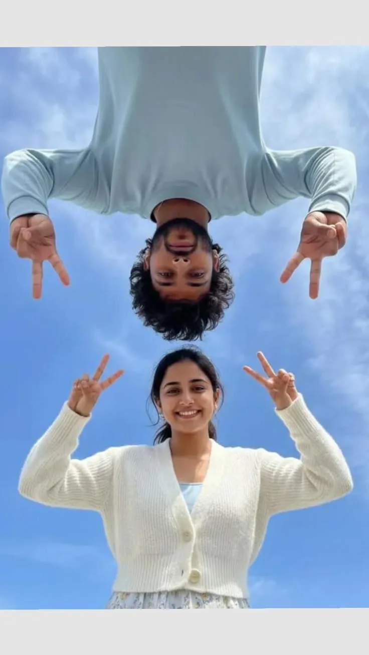 Playful Upside-Down Sky Couple Portrait