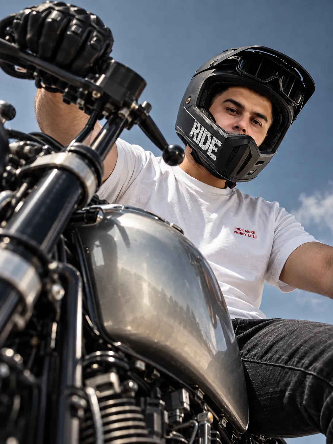 Refined image prompt Dynamic low-angle editorial photograph of the same male rider from the provided reference image, with strict identity