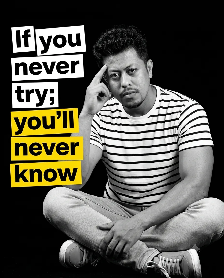 Bold black-and-white editorial poster of a stylish young South Indian man sitting cross-legged against a pure black background, short wavy