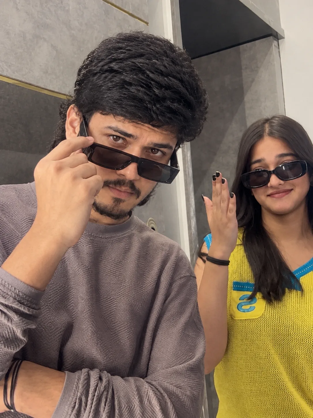 Create an ultra-photorealistic candid couple selfie matching the uploaded reference image as closely as possible.